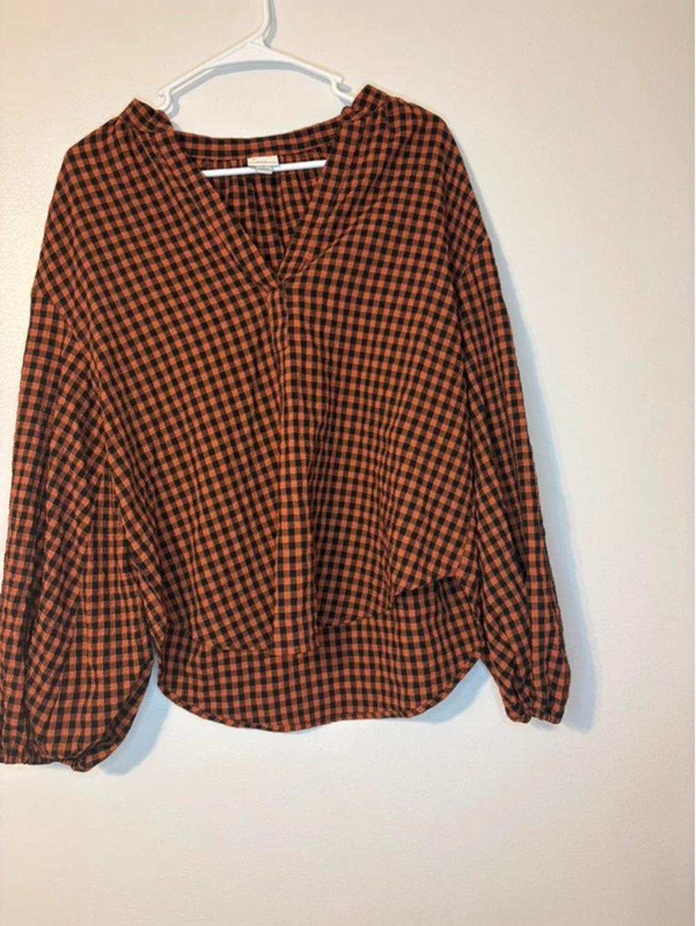 Orange and black blouse